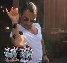 Salt Bae sprinkling salt over the Cowboys team